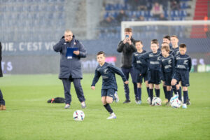 Nos U13 au jeu de la mi-temps lors de SMC VS FC Sochaux Crédit : Damien Deslandes